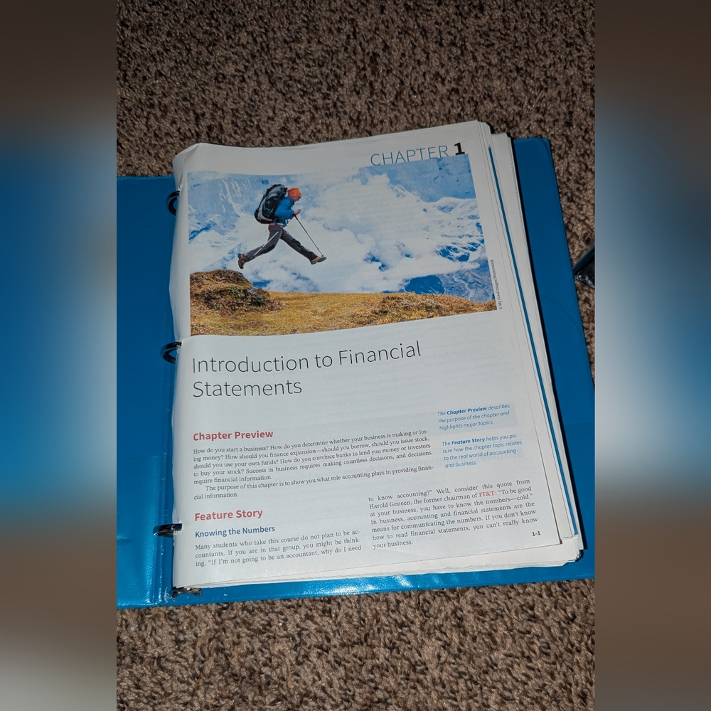 Blue 3-Ring Binder with Financial Textbook Pages
